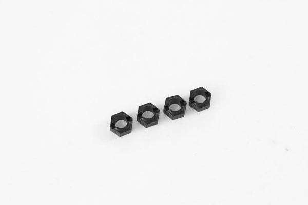 Set of four hex adapters for RC vehicles.